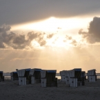 St. Peter Ording - Sonnenuntergang über den Strandkörben